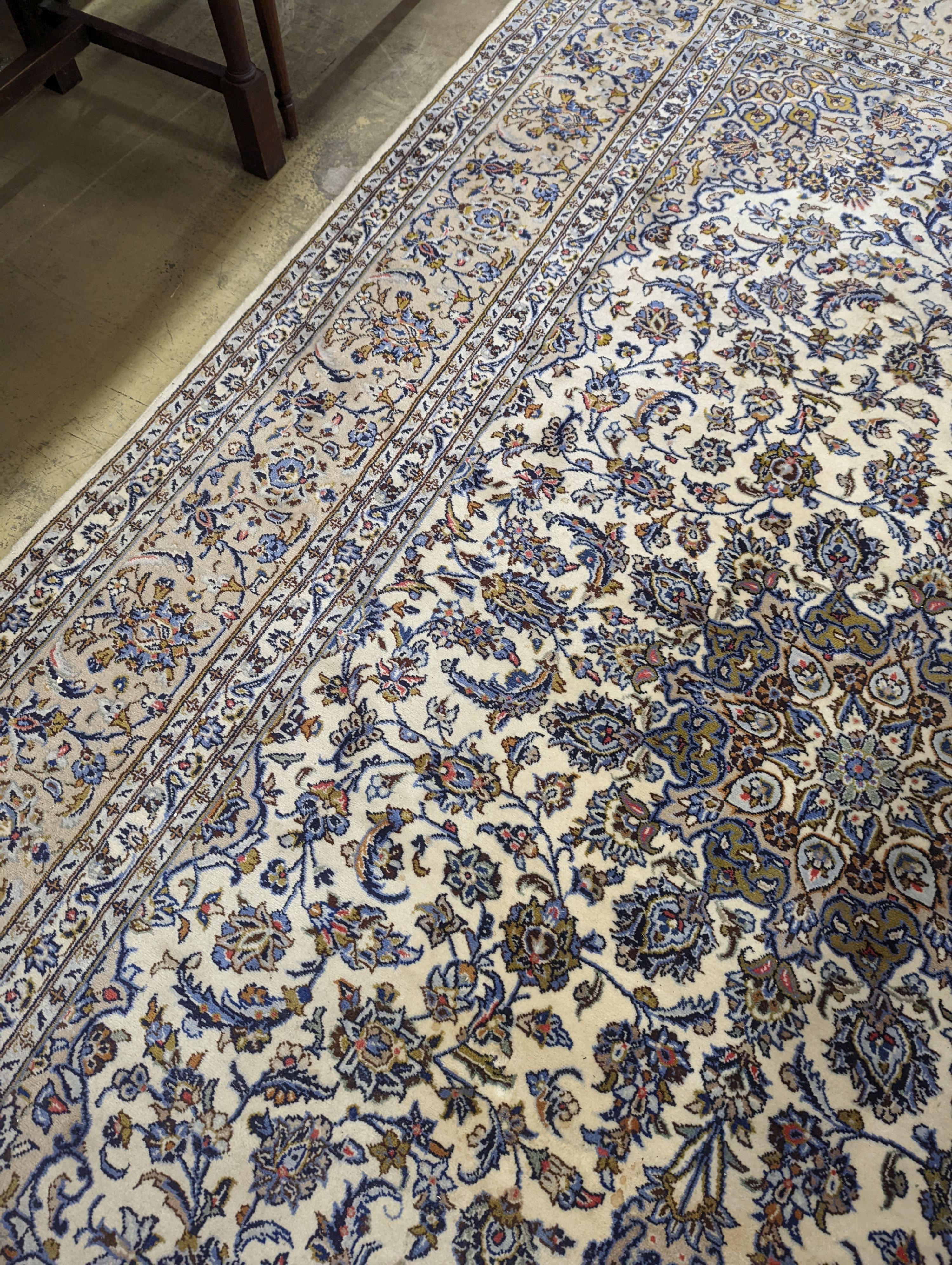 A Nain ivory ground carpet, 315 x 214cm